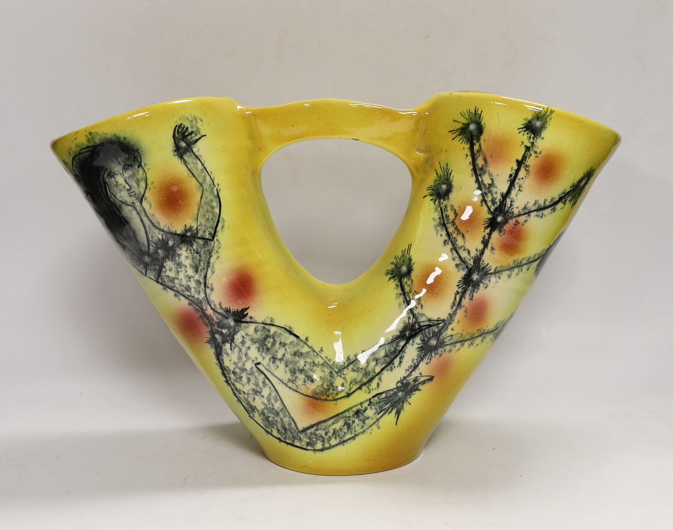 A Spanish pottery twin-stem vase on yellow ground, 24cm